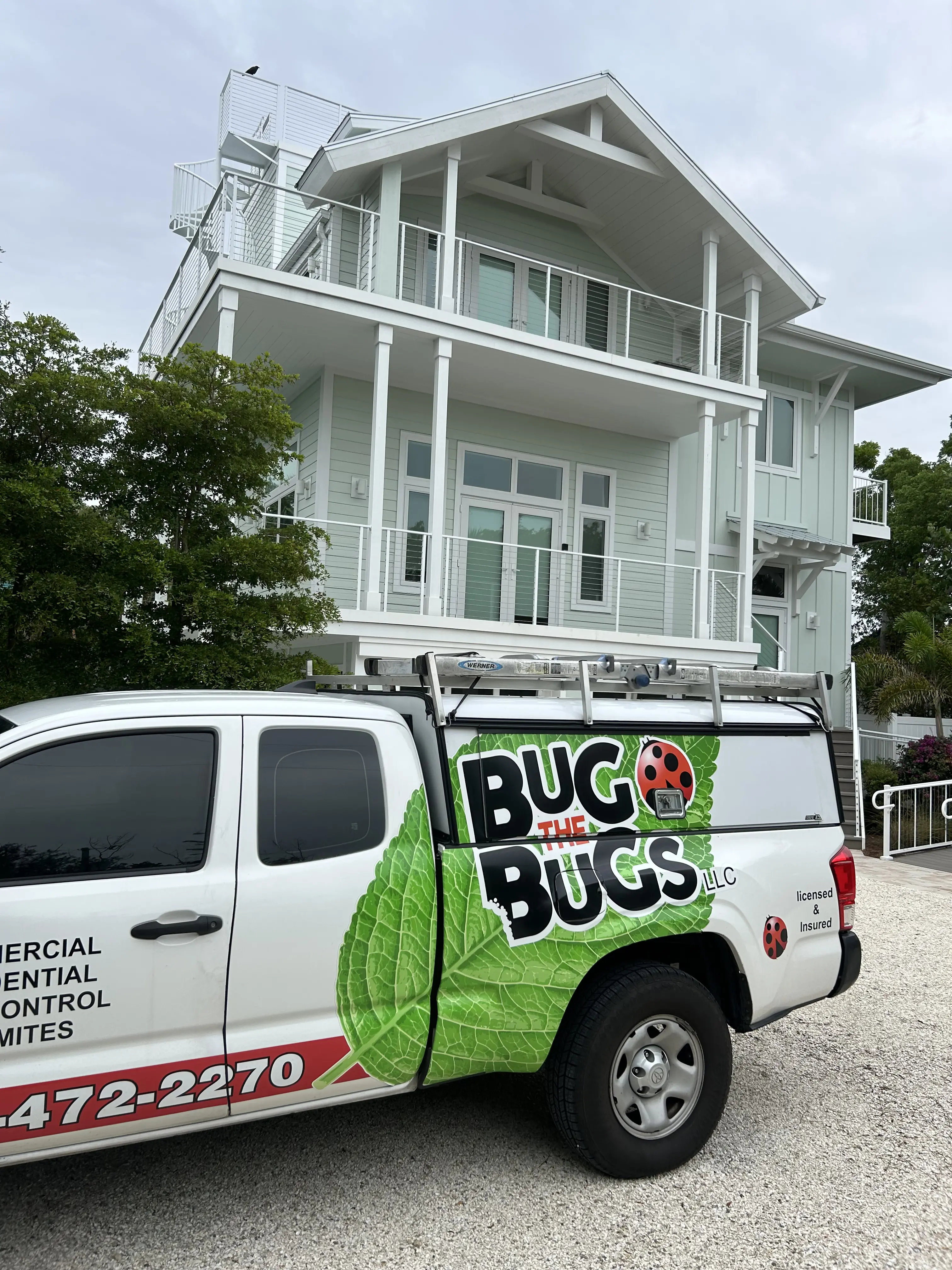 Bug The Bugs service truck outside a residential property